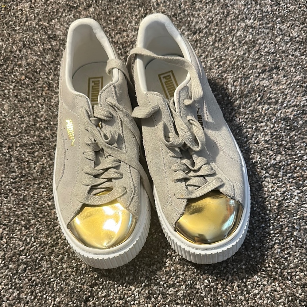 PUMA Platform Shoes with Gold Accents